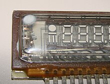 Dead vacuum fluorescent display (Air has leaked in and the getter spot has become white.) Opachki dead vacuum luminescent display bednyaga da.JPG