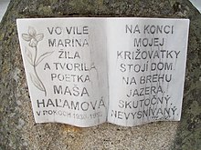 A book-shaped monument to the poet Maša Haľamová in Štrbské Pleso.