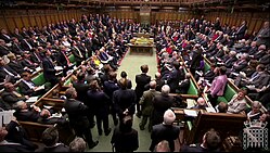 A wide shot of Prime Ministers Questions in 2012, showing the House of Commons packed with members Prime Minister's Questions (Full Chamber).jpg