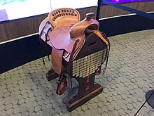 The West Texas Championship Saddle is the traveling trophy between the Red Raiders and Horned Frogs TCU-Texas-Tech-Saddle-Trophy.jpg