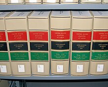 Photograph of volumes of the United States Statutes at Large.