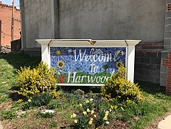 Harwood neighborhood welcome sign at Barclay and East 25th Streets