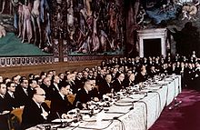 The signing ceremony of the Treaty of Rome on 25 March 1957, creating the European Economic Community, forerunner of the present-day European Union Rims'kii dogovir.jpg