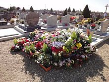 Funeral with flowers on marble 2011 Enterrement de Jacquotte.jpg