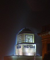 The clock tower of the Herald building in downtown Grand Forks HeraldClockTower.jpg