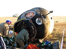 Soyuz TMA reentry capsule after landing, 2005 Jsc2005e41361.jpg