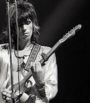 Richards playing guitar in concert, 1972 Keith-Richards and guitar.jpg