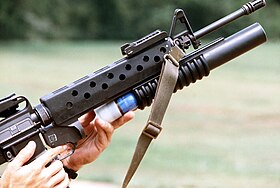 Loading M203 40 mm grenade launcher attached to an M16 rifle.jpg