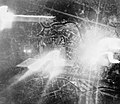 Target indicator flares being dropped on Berlin from a Mosquito during a bombing raid