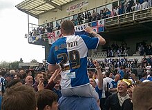 McBurnie celebrating with Bristol Rovers fans following the club's promotion from League Two Oliver McBurnie at Bristol Rovers.jpg