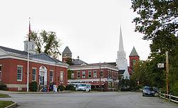 Town center: Plymouth Post Office, Rounds Hall of Plymouth State University (in background), Plymouth Congregational Church, Town Hall (left to right)