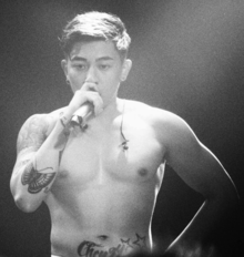 Black-and-white photo of Tyson Yoshi at his concert in 2019