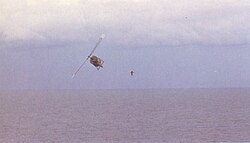 RVNAF pilot jumps into the sea from his UH-1 during Operation Frequent Wind VNAF pilot jumps into the sea from his Huey.jpg