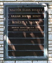 A gravestone inscribed 'Walter Elias Disney', 'Lillian Bounds Disney', 'Robert B. Brown', Sharon Disney Brown Lund ashes scattered in paradise'