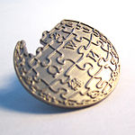 Metal wikiglobe pin