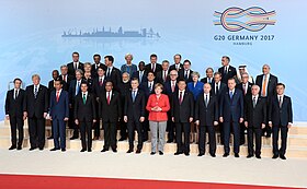 Prime Minister Lee Hsien Loong at the 2017 G20 meeting in Germany. Since 2010, Singapore has often been invited to participate in G20 processes. 2017 G20 Hamburg summit leaders group photo.jpg