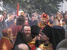 Blessing with holy water during an Eastern Orthodox Bright Week procession in Russia BrightTuesdayProcessionAtSergievPosad.BlessingWithHolyWater.jpeg