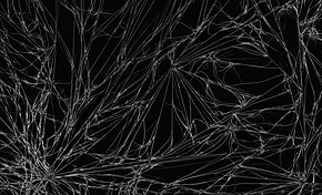 Fibrous crystals of purified caffeine. Dark-field microscopy image, about 7 mm x 11 mm. CaffeineCrystals Fibrous 10xDarkField.jpg