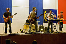 Catchpenny performing during a 2009 Memorial Day celebration at Contingency Operating Base, Basra, Iraq