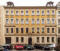 Mietshaus in geschlossener Bebauung und zwei Werkstattgebäude im Hof