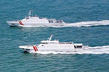 Two patrol ships of the Indonesian Maritime Security Board during a patrol. Kapalbakamla.jpg