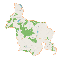 Mapa konturowa gminy Masłowice, na dole znajduje się czarny trójkącik z opisem „Chełmo”