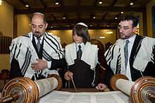 Jewish boy reading a Torah scroll at his Bar Mitzvah, using a Yad Michael's Bar Mitzvah 3.jpg