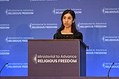 Nadia Murad, a prominent Yazidi human rights activist and survivor of ISIS sexual slavery, delivers remarks at the Ministerial to Advance Religious Freedom at the U.S. Department of State in Washington, D.C. Nadia Murad ahuman rights activist and survivor, delivers remarks (42733243785).jpg