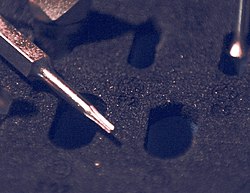 Bilde av et skrujern i eske fra iFixit