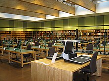 Reading room of the National Archives of Norway. In the foreground are overhead scanners. Since archival materials are unique, some archives may have equipment available for users to duplicate materials. Reading hall of the Norwegian National Archive (Gardmanahay).jpg