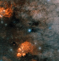 A Giles 667 csillagai (világos csillag, középen)