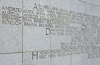 Names engraved on the wall of the monument.