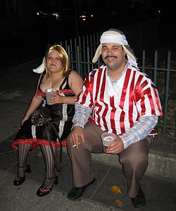 Halloween revelers in the French Quarter costumed as Darlene and Ignatius