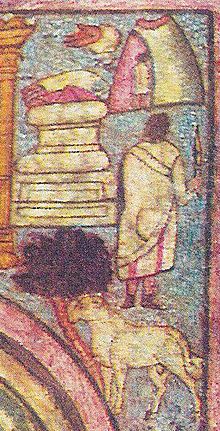 Wall paintining in Dura Synagogue: Abraham is depicted holding a knife and facing the tied Isaac; behind him there's a lamb with its horns stuck on a tree's branches. Some winged being is depicted on the scene