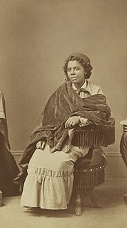Edmonia Lewis was of Mississauga Ojibwe, African-American and Haitian descent.[64]