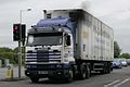 Scania R143M 500 lorry with a refrigerated trailer.