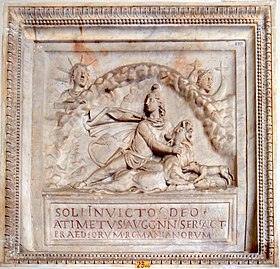 Bas-relief depicting the tauroctony. Mithras is depicted looking to Sol Invictus as he slays the bull. Sol and Luna appear at the top of the relief. Musei Vaticani - Mithra - Sol invictus 01136.JPG