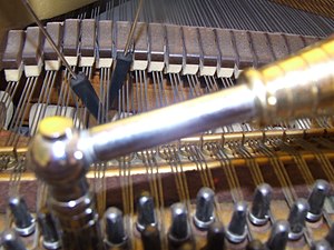 English: Piano tuner's most basic tools: tunin...