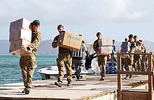 Royal Marines delivering aid and providing support to the islanders of Jost Van Dyke, British Virgin Islands Royal Marines deliver aid to British Virgin Islands following Irma.jpg