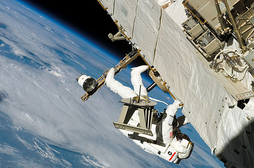 Sellers translating along truss during EVA-3 on STS-121