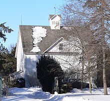 Wood-frame building with few windows