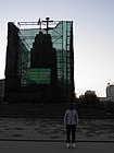 The dismantled Lenin statue on 7 October 2014. A cross and a Ukrainian flag are visible.