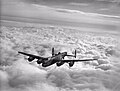 Pin-up quality image of a Lanc over cloud