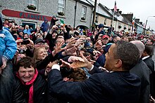 President Barack Obama greets local residents on Main Street in Moneygall, Ireland, May 23, 2011. Barack Obama shakes hands in Moneygall.jpg