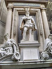 Statue of Protestant leader Gaspard II de Coligny over the portal