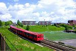 A T1000 train of the Grorud Line passing Linderud towards Vollebekk in 2000