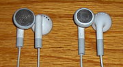 Two designs of iPod earbuds.