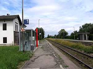 Double-tracked railway line with side platforms