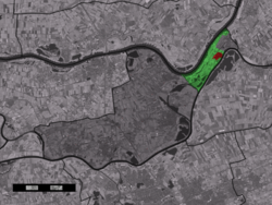 The village centre (red) and the statistical district (light green) of Heerewaarden in the municipality of Maasdriel.