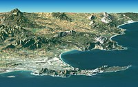 Kaapstad uit die ruimte gesien, met die uitsig oos oor die Kaapse Skiereiland en Valsbaai (agter) met Robbeneiland (links voor), Tafelberg (middel voor) en Kaappunt (regs voor)